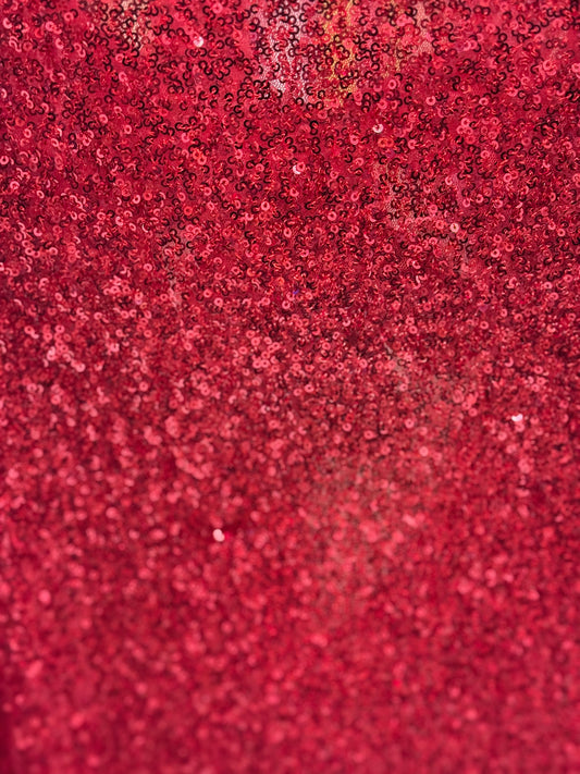 Abito con fiocco e paillettes