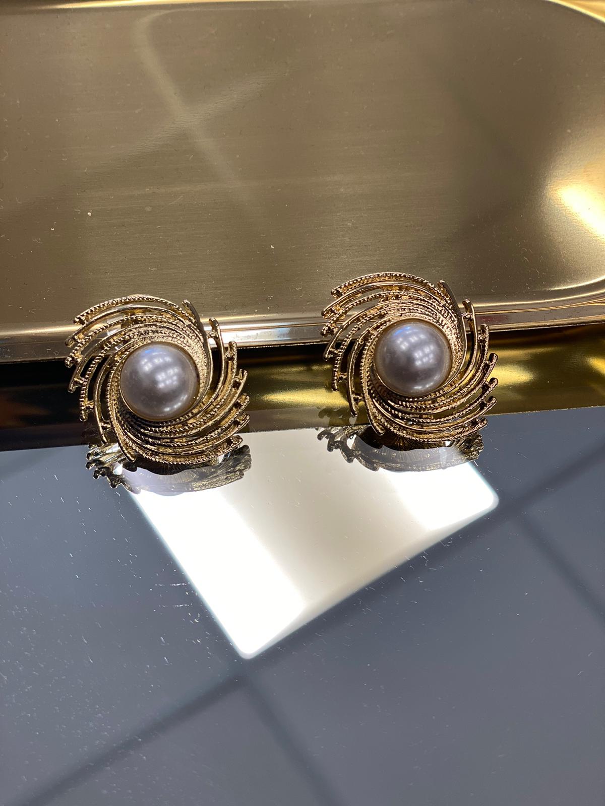 Orecchini Perla Rotante