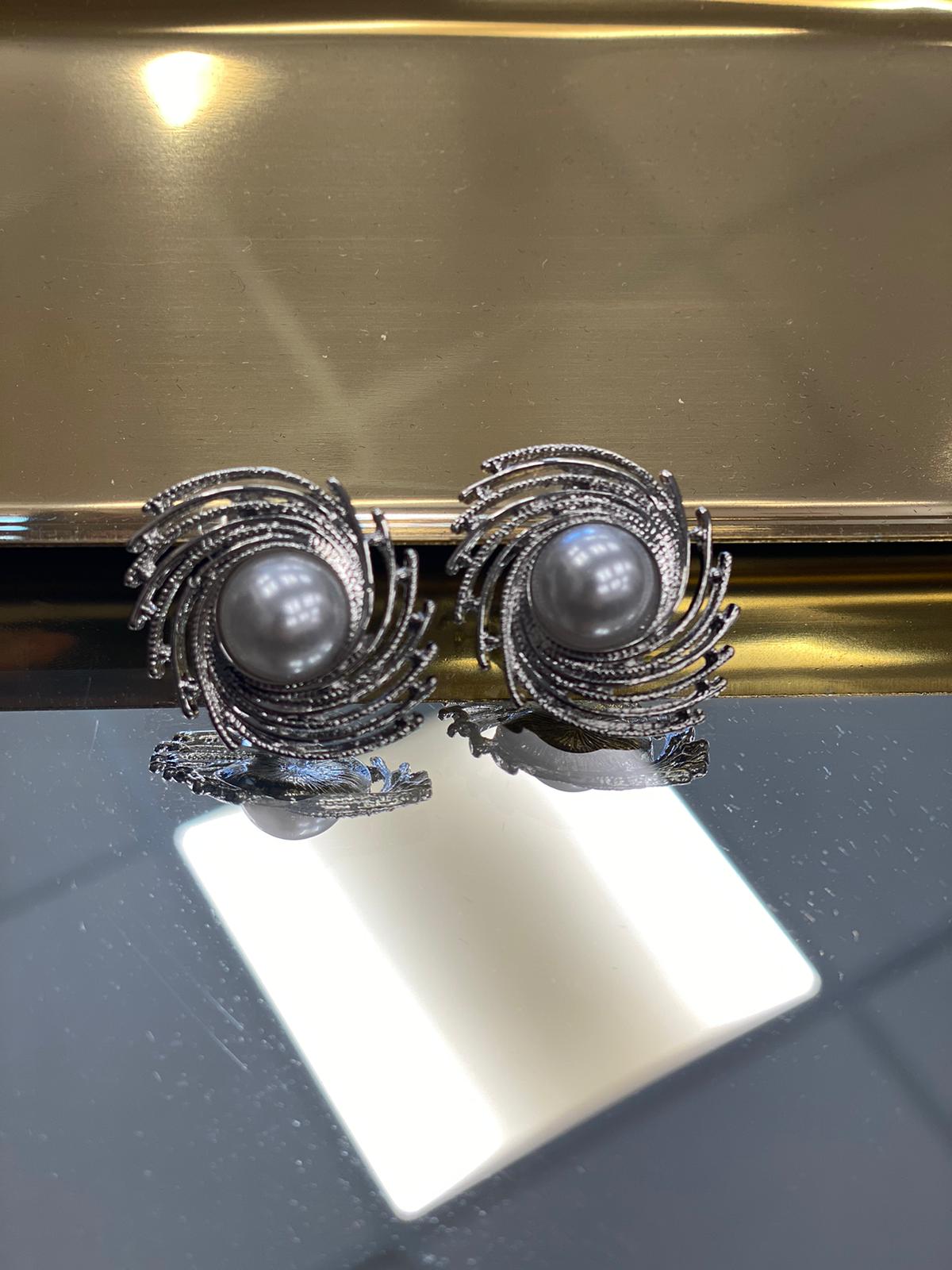 Orecchini Perla Rotante